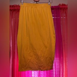 REBDOLLS knee length, large, gold, fitted skirt